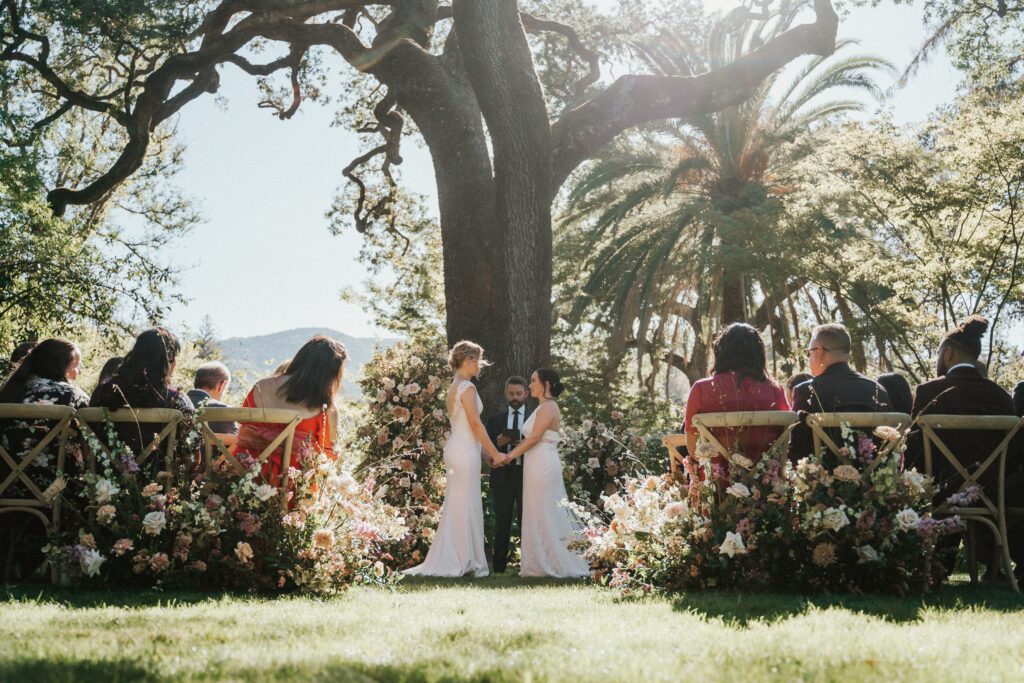 two brides getting married at their luxury wedding at beaulieu garden in Napa California